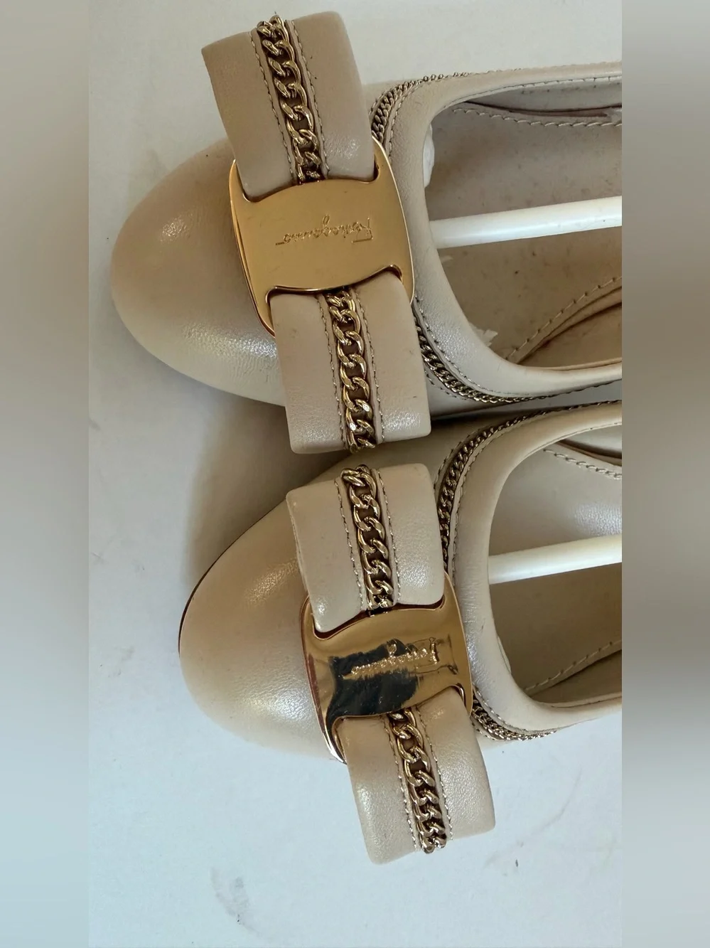 Salvatore Ferragamo Cream Vara Bow Flats with Gold Chain Accent
